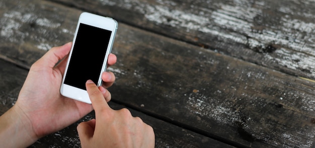 Woman use mobile phone in coffee shop 