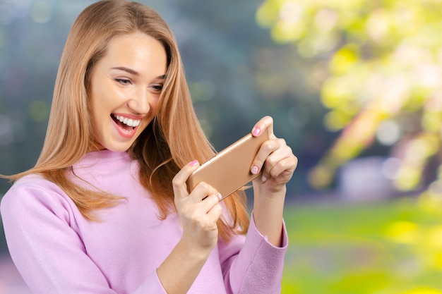 Woman uses a smartphone