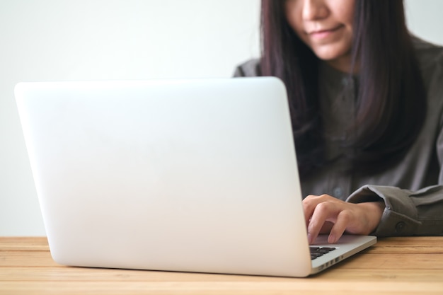 Woman using computer laptop