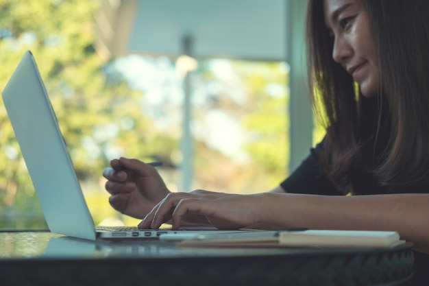 Woman using computer laptop