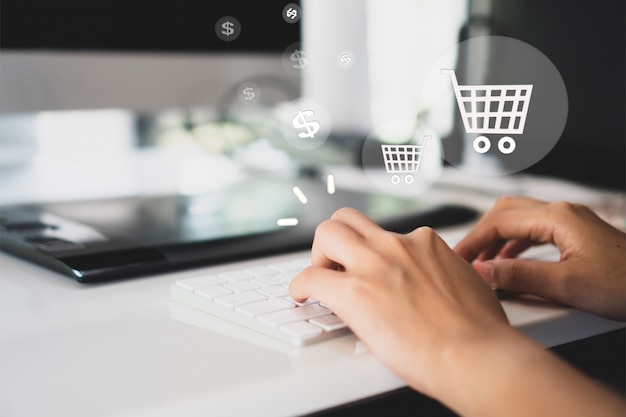 Woman using the computer to shop online