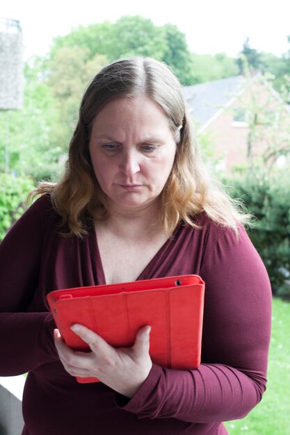 Woman using digital tablet