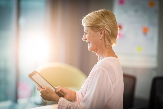 Woman using digital tablet