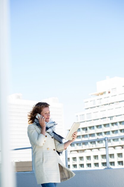 Woman using digital tablet