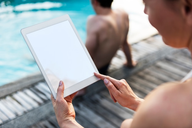 Woman using digital tablet