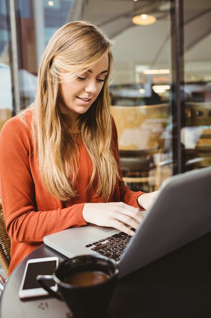 Woman using her laptop