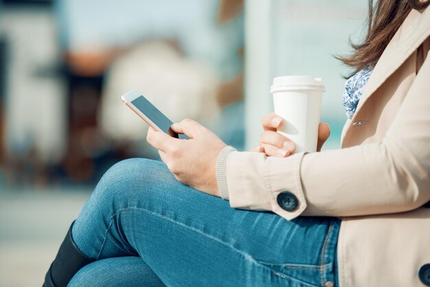 Woman using her smart phone