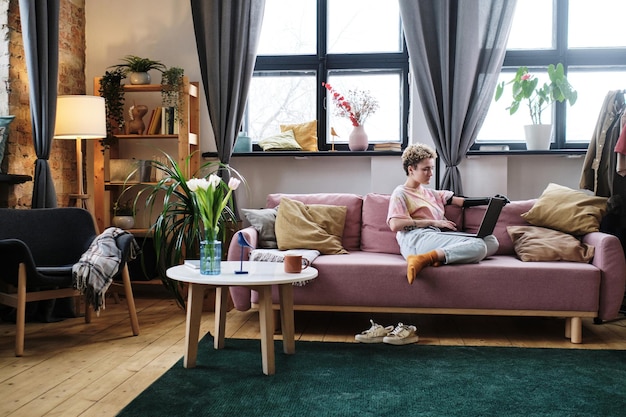 Woman using laptop at home