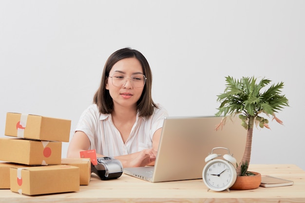 Woman using a laptop at home