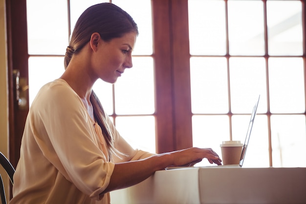 Woman using a laptop