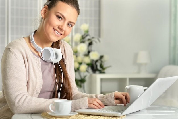 Woman using at laptop