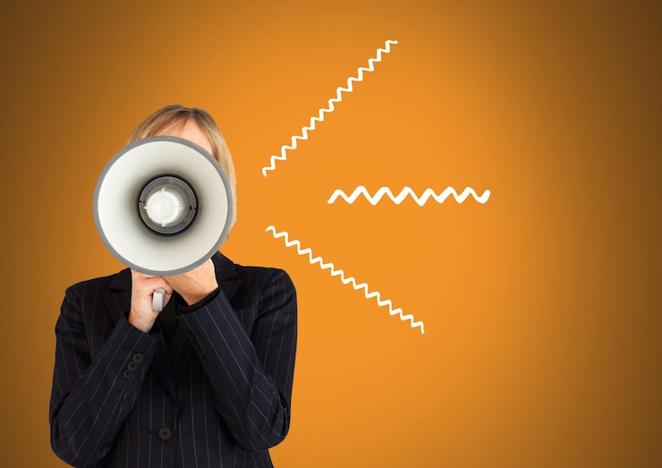 Photo woman using megaphone with illustrations