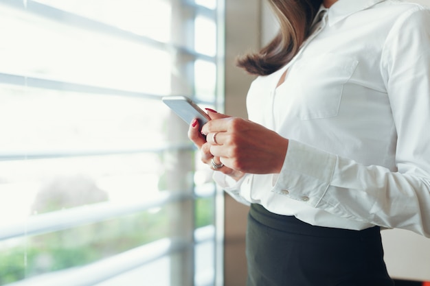 Woman using mobile phone