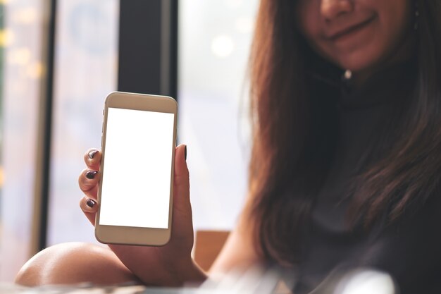 Woman using mockup smart phone 