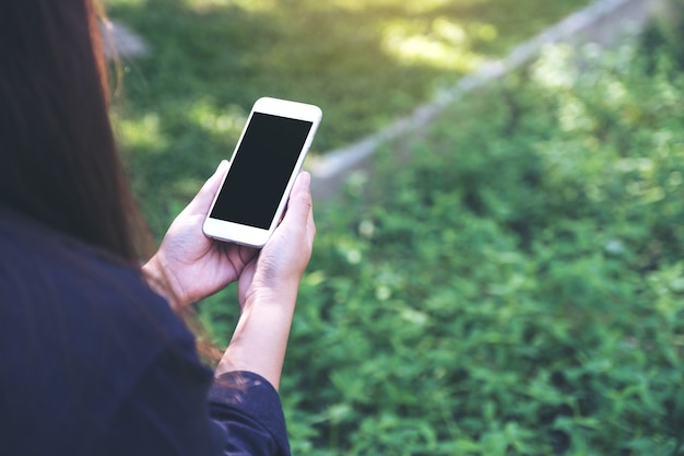 Woman using mockup smart phone 