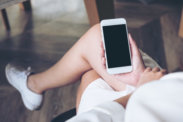 Woman using mockup smart phone 