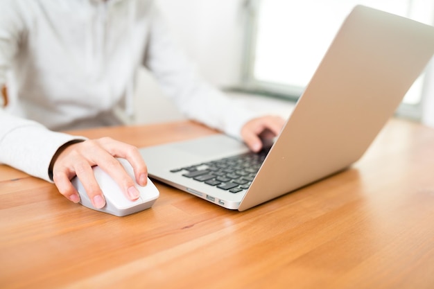 Woman using notebook computer