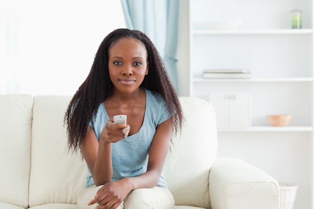 Woman using remote control