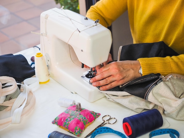 Woman Using Sewing Machine