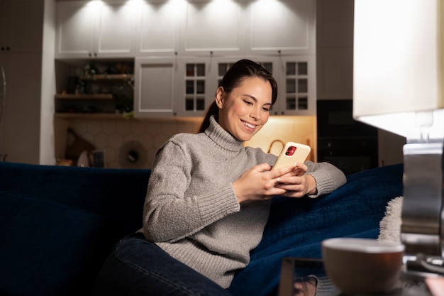 Woman using smartphone as a habit