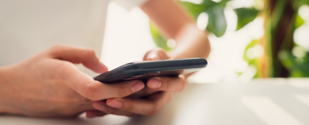 Woman using smartphone.