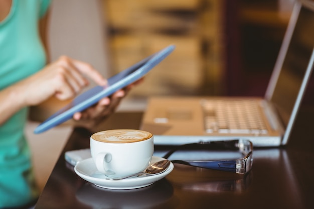 A woman using tablet computer 