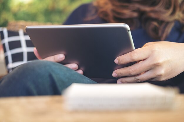 woman using tablet pc