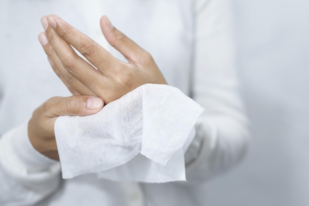 woman using tissue paper Clean your hands to remove germs
