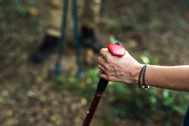 Woman using a trekking pole