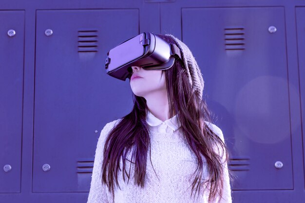 Woman using VR glasses