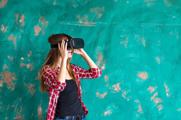 Woman in virtual reality headset enjoying her experience.