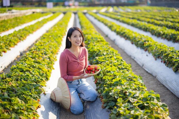 Woman visit the strawberry farm