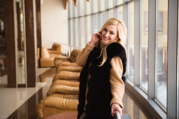 woman waiting for the arrival of the aircraft