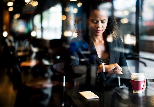 Woman waiting at a cafe