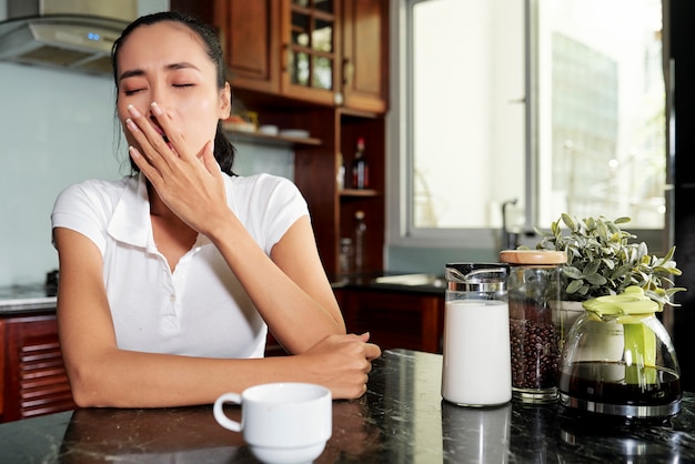 Woman waking up in the early morning