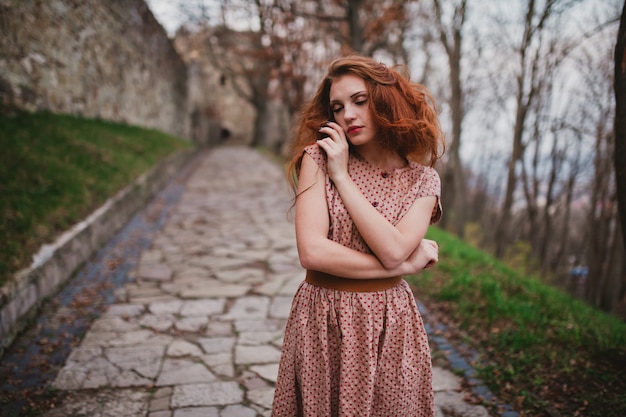 Woman walking along path