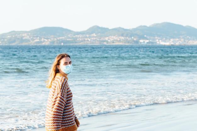 Woman walking on the beach