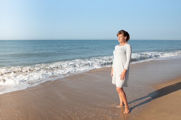 Woman walking on the beach