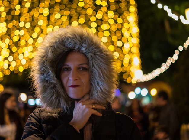 woman walking at Christmas, with Christmas decorations