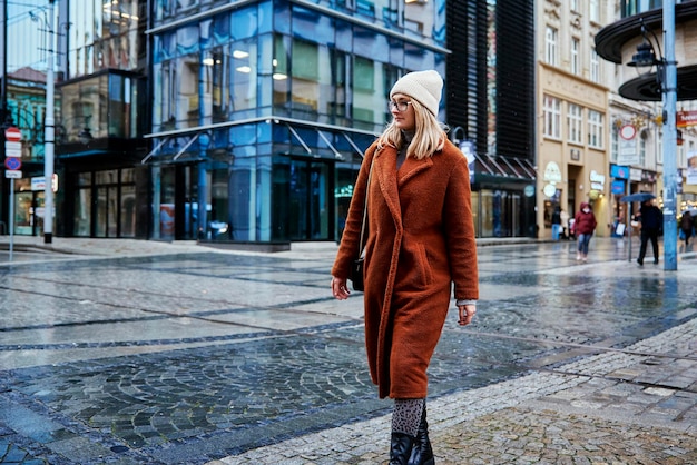 Woman walking at city street