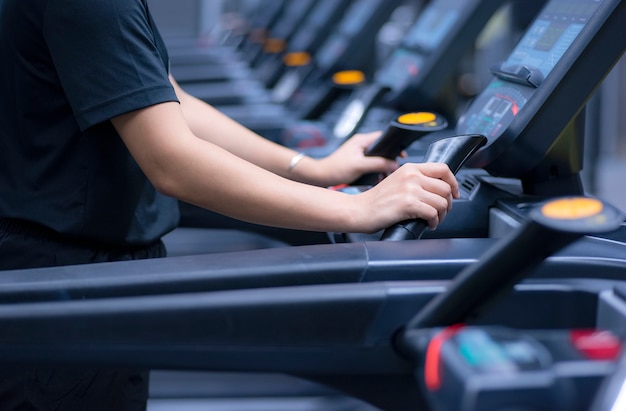 Woman walking or running on treadmill