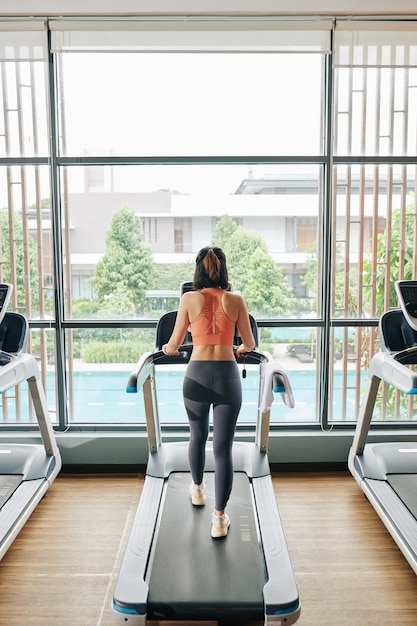 Woman walking on treadmill