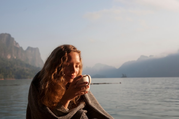 Woman warm in the morning sun