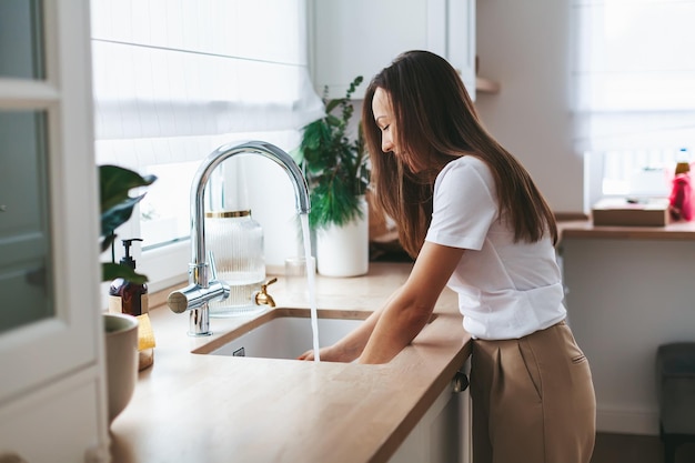 Woman washing the dishes