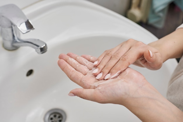 Woman washing hands