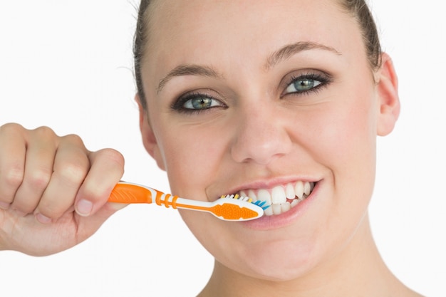 Woman washing her teeth