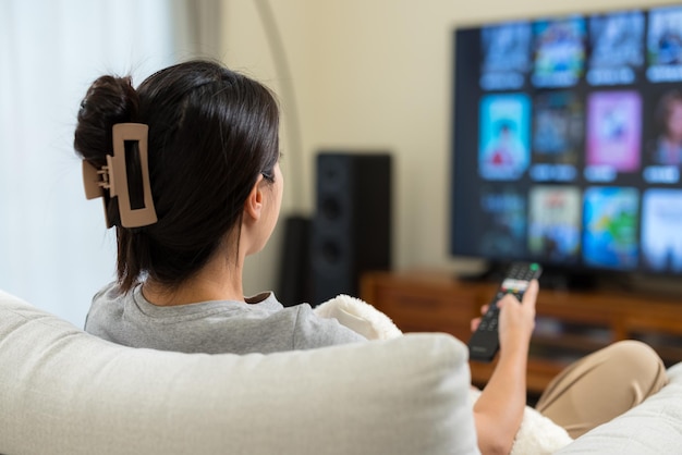 Woman watch TV at home