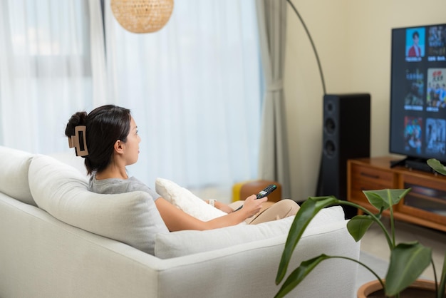 Woman watch TV at home