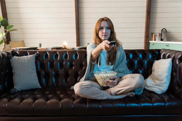 woman watching a movie on streaming service