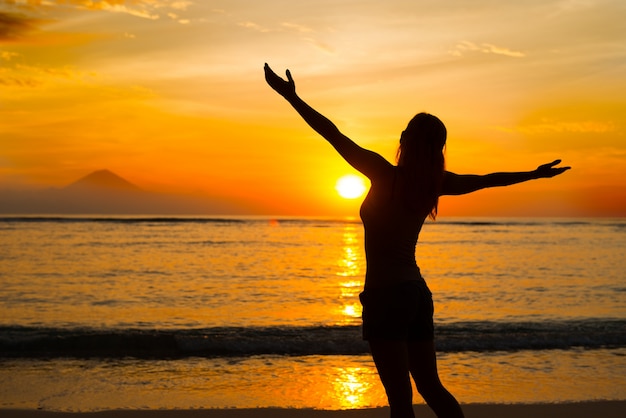 Woman watching sunset